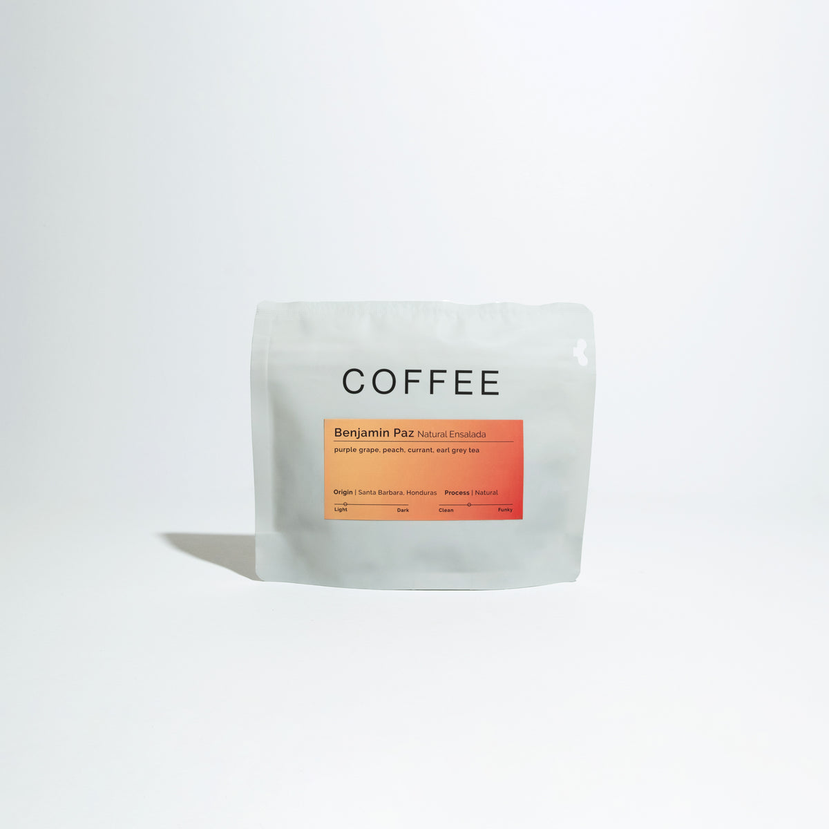 Minimalist matte-white pouch labeled “COFFEE,” featuring “Benjamin Paz Natural Ensalada” with flavor notes and origin details. Titled Salad Set - Benjamin Paz.