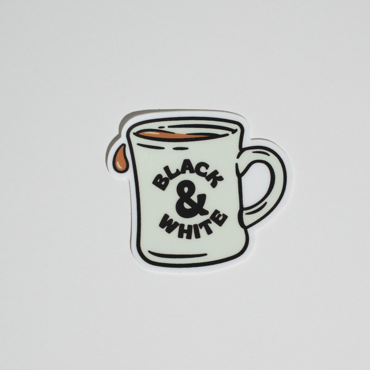 B&W Diner Mug Sticker by Sage Pizza, featuring a playful illustration, measures 1.5 inches square.
