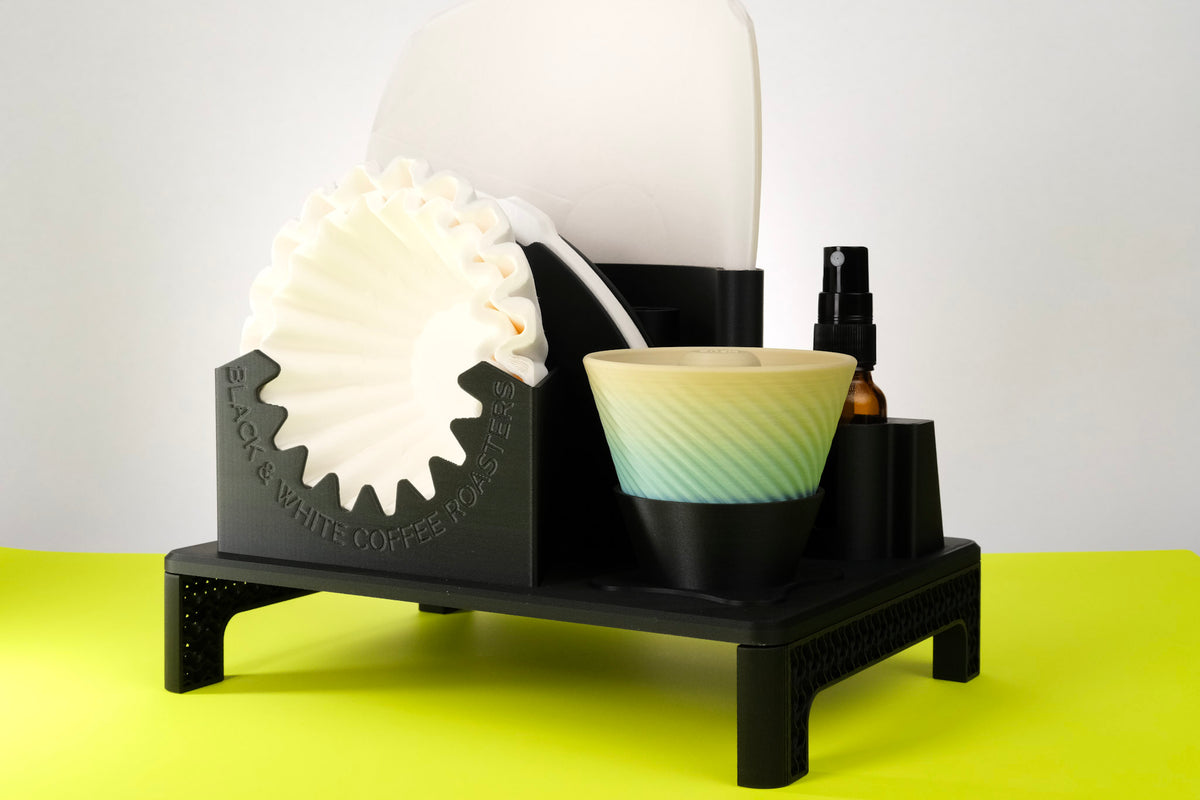 B&W Lab - Filter Holder, elegantly organizes coffee filters and accessories, featuring dedicated spaces for Comandante C40, crank, Negotiator, and RDT spray bottle.
