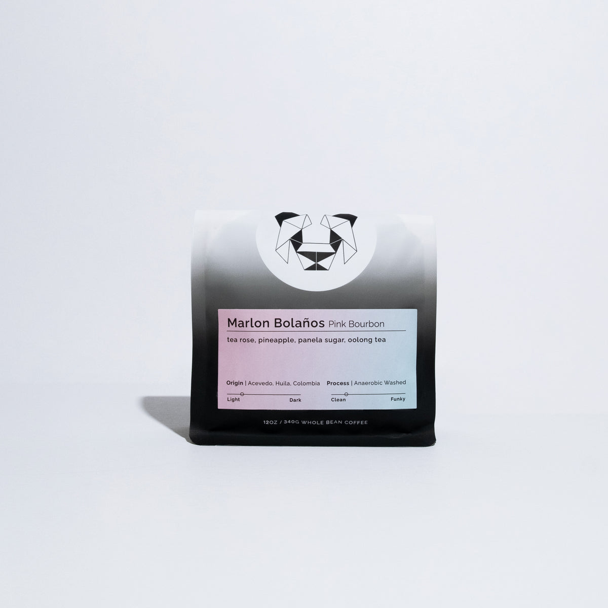 A single bag of Marlon Bolaños Pink Bourbon, featuring a black and white gradient package with a white label, set against a clean white background.