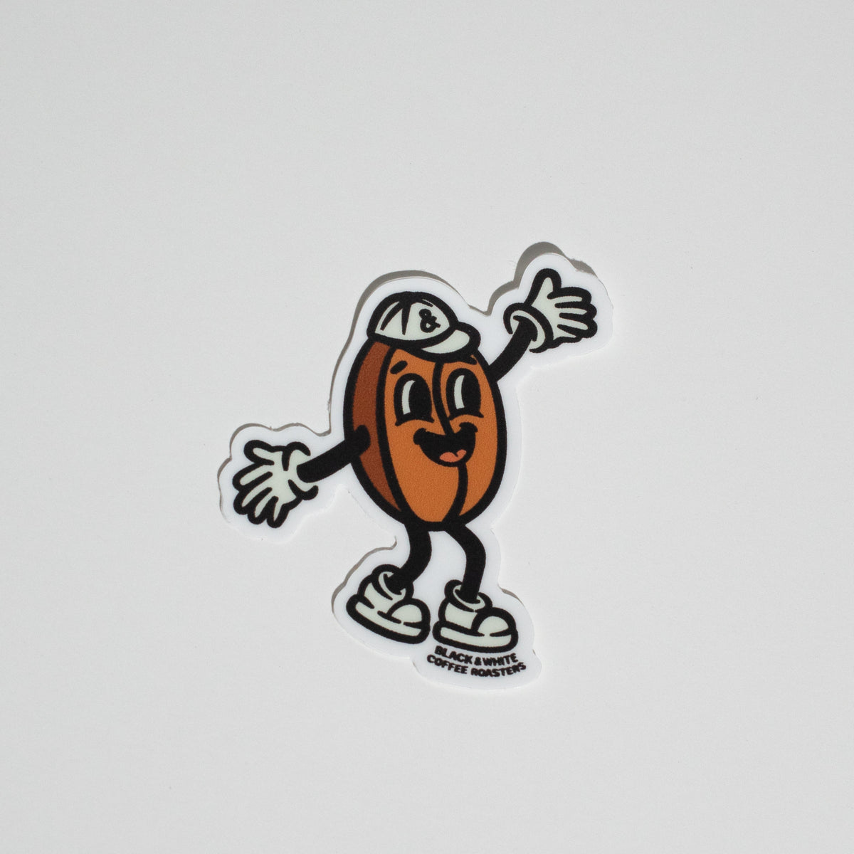 B&W Dancing Bean Sticker by Sage Pizza, featuring a whimsical bean character in motion, designed in a 2 x 2 format.