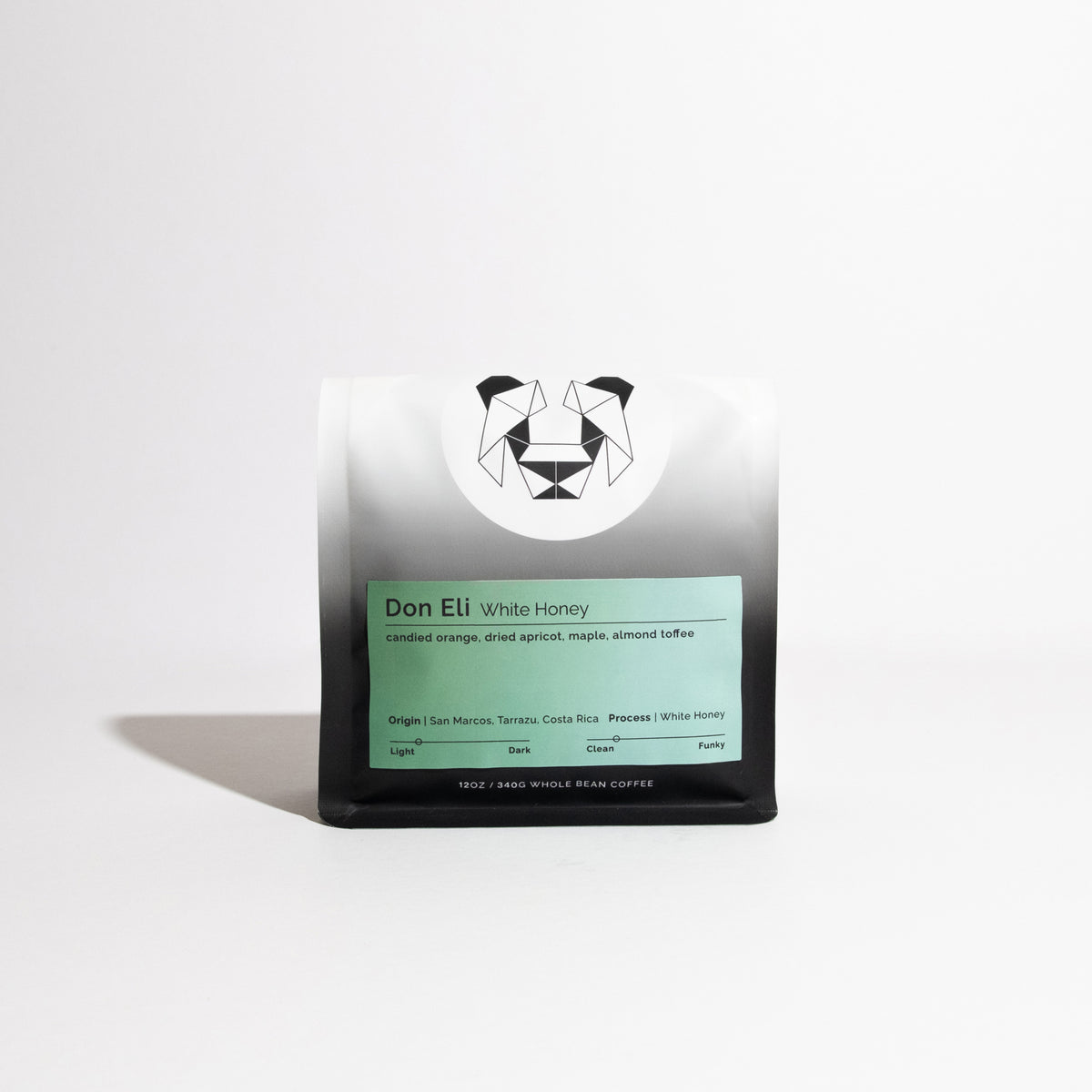 Don Eli White Honey coffee bag, featuring tasting notes of candied orange and almond toffee, from San Marcos, Costa Rica, with a geometric logo.