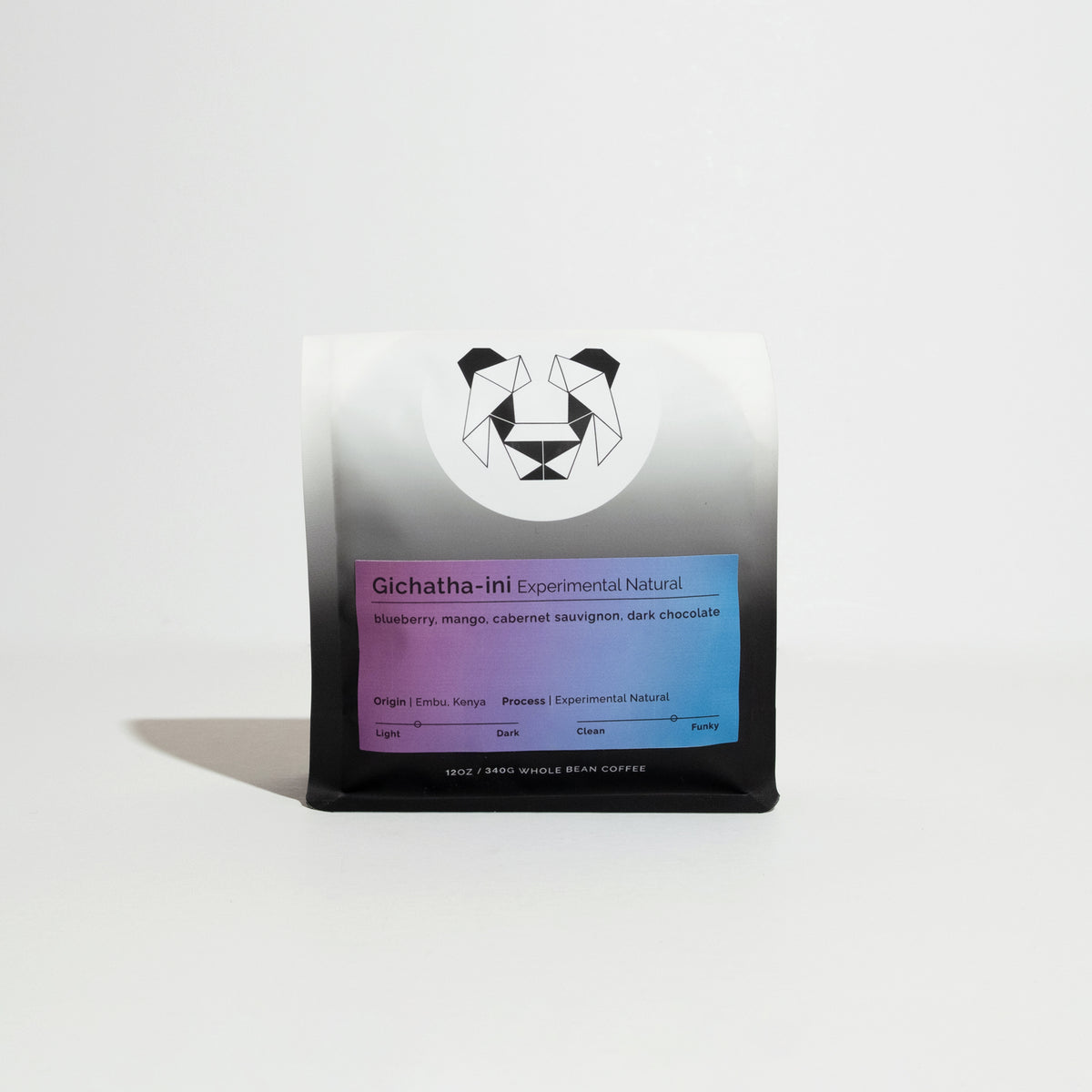 Retail bag of whole-bean coffee labeled “Gichatha-ini - Experimental Natural,” featuring tasting notes of blueberry, mango, cabernet sauvignon, and dark chocolate; origin Embu, Kenya.
