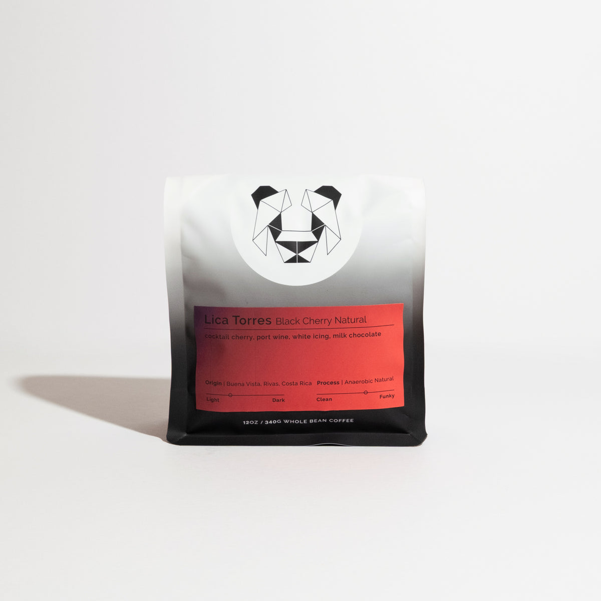 Lica Torres - Black Cherry Natural coffee, 12 oz bag with a red label featuring tasting notes and origin, showcasing a unique anaerobic natural process.