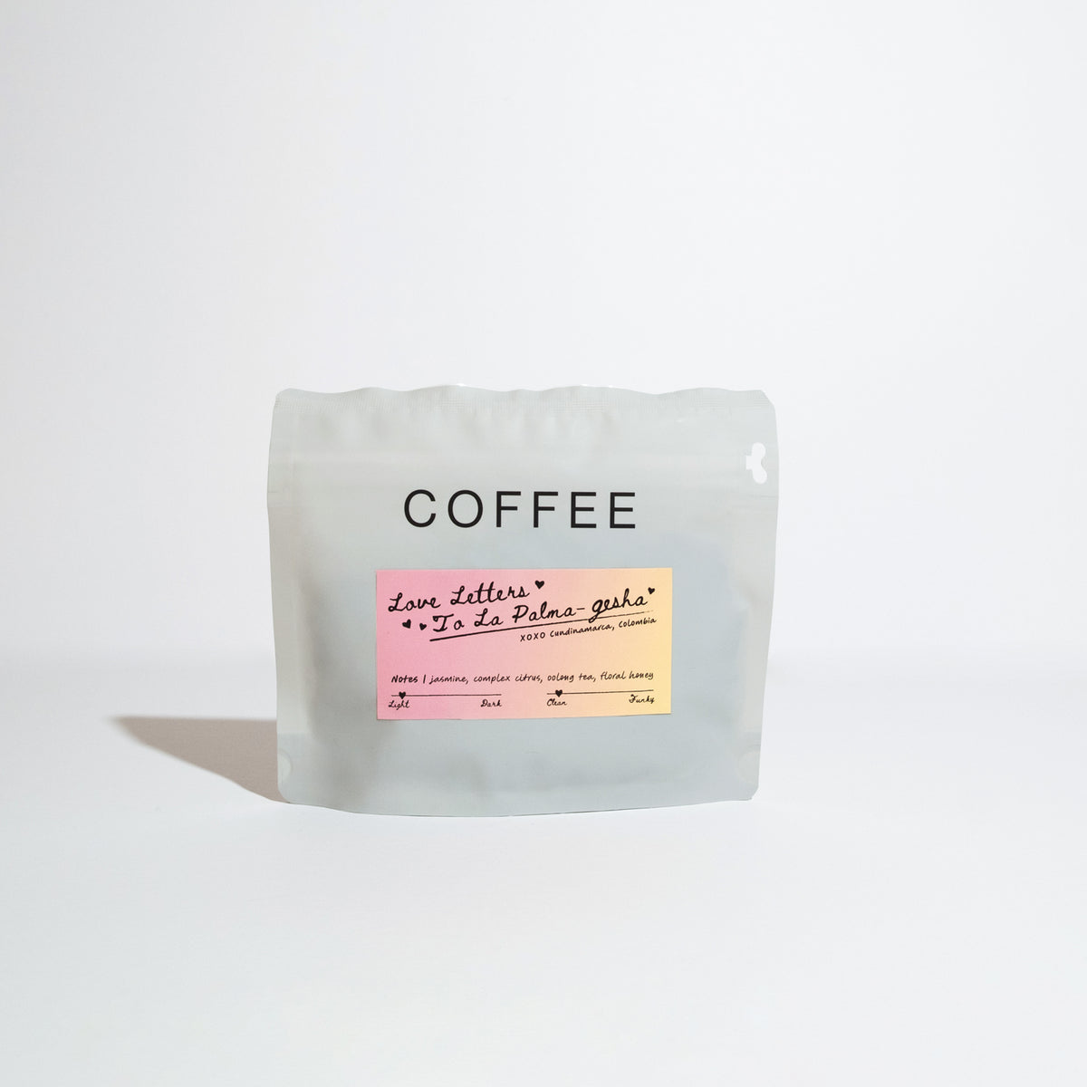 Resealable bag of specialty coffee labeled Love Letters to La Palma, featuring flavor notes of jasmine, complex citrus, oolong tea, and floral honey.