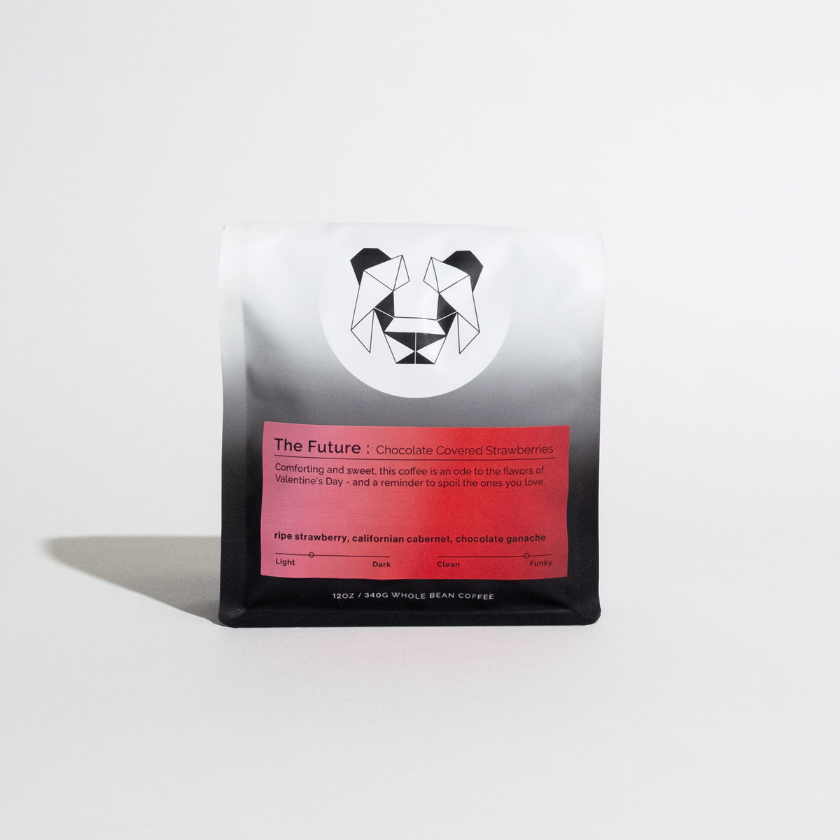Bag of The Future: Chocolate Covered Strawberries whole-bean coffee with geometric animal logo, red label, and roast level scale, emphasizing chocolate and strawberry flavors.