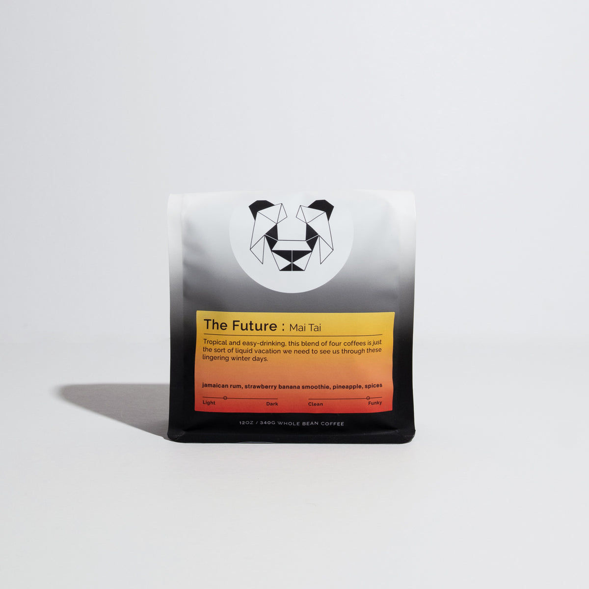 Bag of whole-bean coffee, The Future: Mai Tai, with geometric panda logo; notes of Jamaican rum, strawberry banana, pineapple, and spices. Tropical, dark, funky blend.